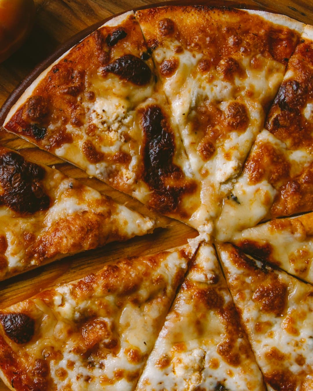 Cheese pizza with cherry tomatoes